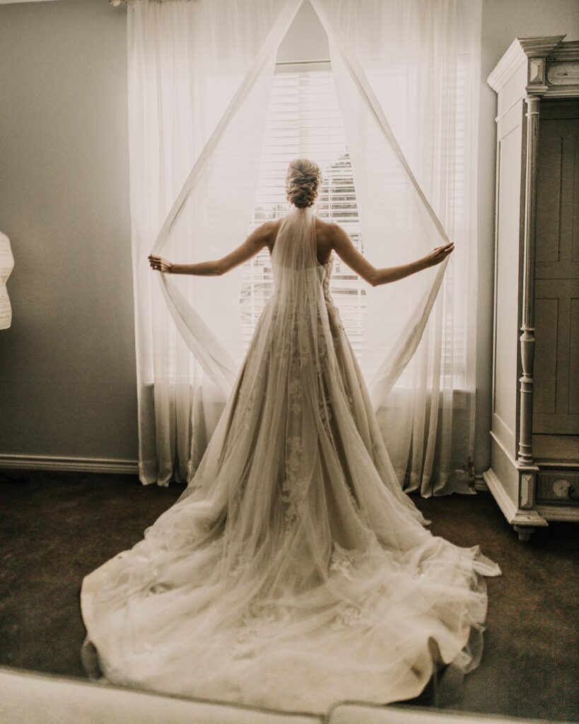 Houston area wedding venue bride at window